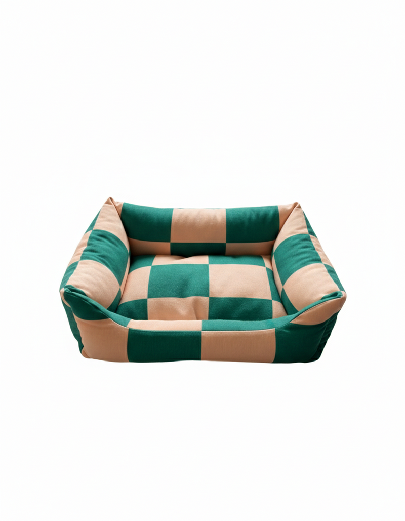 The Fritz Nest Bed in a green and cream checked print, bolster dog bed