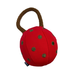 Red Holiday Ornament dog toy with green embroidered dots and a brown rope handle