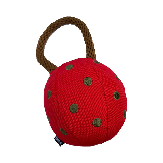 Red Holiday Ornament dog toy with green embroidered dots and a brown rope handle