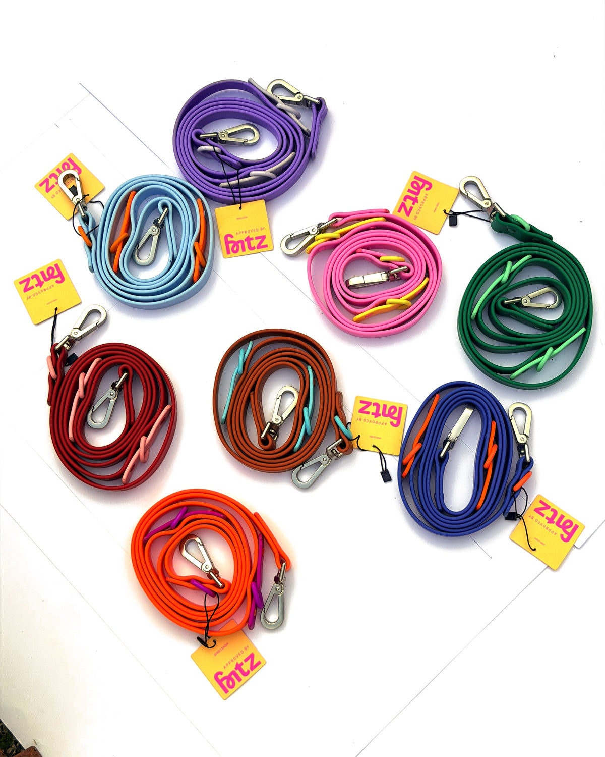 All eight Fritz Leash colours coiled on a white board, with their hangtags