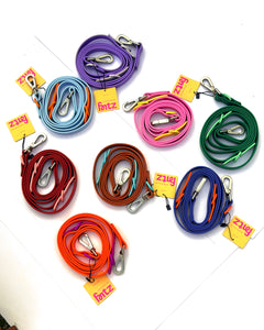 All eight Fritz Leash colours coiled on a white board, with their hangtags